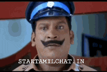 a man with a mustache is wearing a police hat and a shirt .