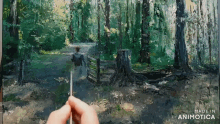 a person is painting a painting of a forest with trees and a fence .