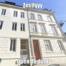 a picture of a building with the words open da door