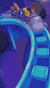 a roller coaster with a cartoon character on it