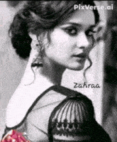 a black and white photo of a woman with the name zahraa on it