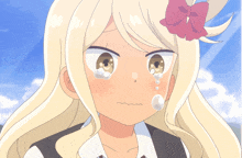 a girl with blonde hair and a red bow on her head crying