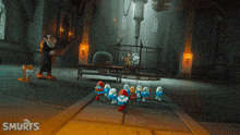 a group of smurfs are standing in a room with the word smurfs on the bottom
