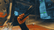 a person is holding a pair of scissors with the letters ccc on it