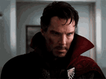 a close up of a man wearing a red coat