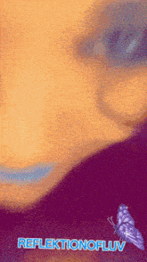 a close up of a person 's face with a butterfly and the words reflexionofluv below it