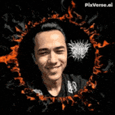 a man is standing in front of a circle of fire and smiling .