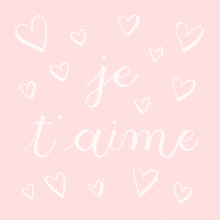 a pink background with white hearts and the words je t'aime in white