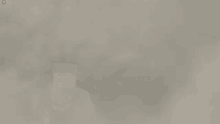 a screenshot of a video game with a smokey background .