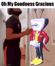 a man standing next to a cartoon character that says oh my goodness gracious on it
