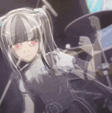 a girl with pigtails is playing drums in a band .