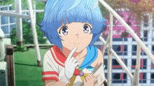 a girl with blue hair is standing on a staircase holding a book .