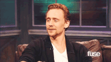 Cheese GIF - Tom Hiddleston Smile Laugh GIFs