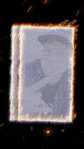 a picture of a man in a hat is behind a fire frame
