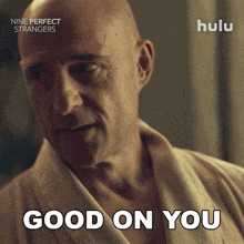 an advertisement for nine perfect strangers shows a bald man in a robe saying good on you