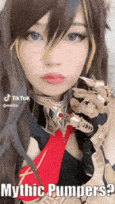 a woman with long nails is wearing a red tie and has the words mythic pumpers below her