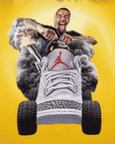 a man is riding a lawn mower made out of a pair of sneakers