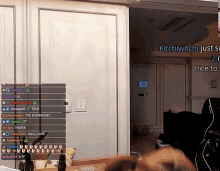a screenshot of a video game with the name kitchiwitchi on the top