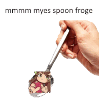 a hand is holding a spoon with a picture of a girl on it and the caption mmmm myes spoon froge