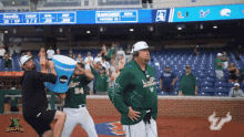 a bullpen logo can be seen in the background of this baseball game