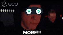 a man with a mask on his eyes is screaming with the words more written below him