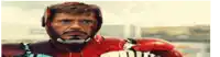 robert downey jr. is wearing a red iron man suit and helmet .