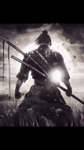 a samurai is kneeling down in a field holding a sword