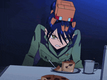 a girl with a robot on her head is looking at a cake on a table