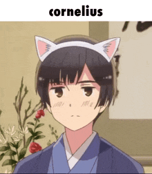 a boy wearing a cat ear headband with the word cornelius on the bottom