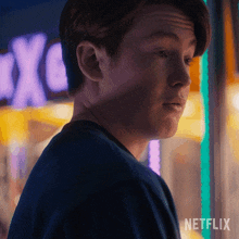 a close up of a man 's face with the word netflix on the bottom