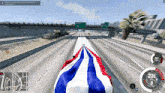 a screenshot of a video game shows a highway with a sign that says freeway 5