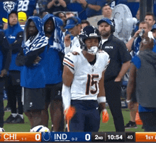 a football game is being played between the indiana colts and thechicago bears