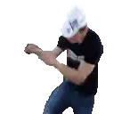 a man wearing a hat and a black shirt is kneeling down