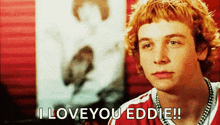 a young man with red hair is saying i love you eddie .