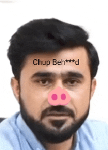 a man with a beard has a pig nose and the words chup beh *** d written on his forehead