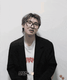 a man wearing glasses and a t-shirt that says jerry