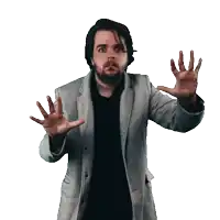 a man in a suit and black shirt is making a funny face