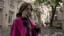 surprised emily cooper lily collins emily in paris phone call