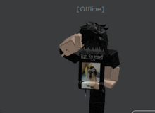 a person wearing a black shirt that says " wait i 'm goated "