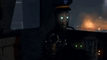 a man in a hat is sitting in a dark room