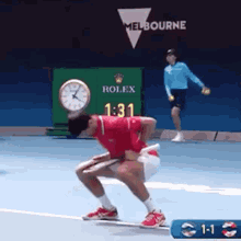 novak djokovic squat deep knee bend tennis warm up