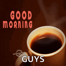 a cup of coffee with the words " good morning guys " on it