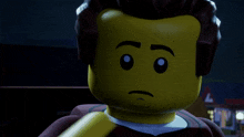 a close up of a lego man 's face