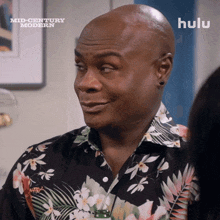 a man in a hawaiian shirt is featured on hulu 's mid century modern