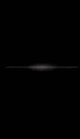 a blurry picture of a woman 's face with a rainbow colored background