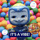 a cartoon character says it 's a vibe in front of a bunch of colorful balls