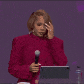 a woman singing into a microphone with the words oh don 't do on the bottom