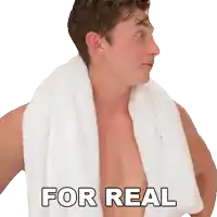 a shirtless man with a towel around his neck has the words for real on his chest