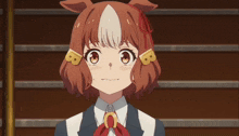 a girl with the letters b on her ears