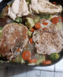 dinner food pork chop chicken veggies